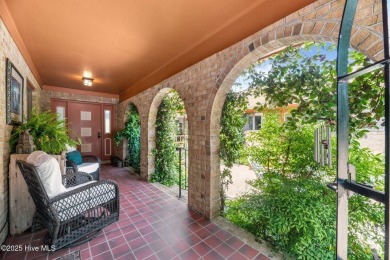 This Mediterranean-style brick home offers panoramic views of on Harbour Point Golf Club in North Carolina - for sale on GolfHomes.com, golf home, golf lot