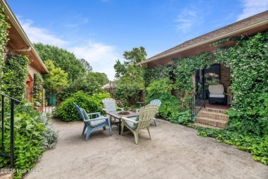 This Mediterranean-style brick home offers panoramic views of on Harbour Point Golf Club in North Carolina - for sale on GolfHomes.com, golf home, golf lot