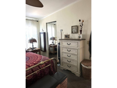 This spacious residence of 2 bedroom features oasis landscaping on Schalamar Creek Golf and Country Club in Florida - for sale on GolfHomes.com, golf home, golf lot