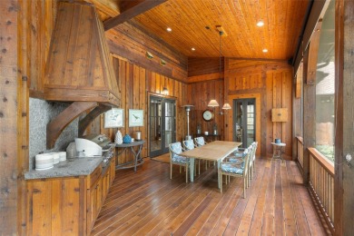 Welcome to a sophisticated mountain retreat on the banks of the on Cullasaja Club in North Carolina - for sale on GolfHomes.com, golf home, golf lot