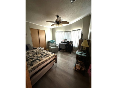 This spacious residence of 2 bedroom features oasis landscaping on Schalamar Creek Golf and Country Club in Florida - for sale on GolfHomes.com, golf home, golf lot