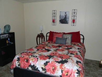 1985 Ventura 26x48 has been updated with double pane windows on Grasslands Golf and Country Club in Florida - for sale on GolfHomes.com, golf home, golf lot