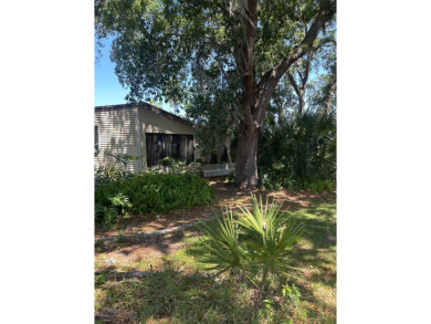 This spacious residence of 2 bedroom features oasis landscaping on Schalamar Creek Golf and Country Club in Florida - for sale on GolfHomes.com, golf home, golf lot