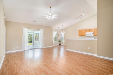 Elegant Ranch-Style Home with Serene Pond Views--Minutes from on Sandpiper Bay Golf and Country Club in North Carolina - for sale on GolfHomes.com, golf home, golf lot