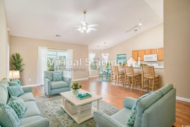 Elegant Ranch-Style Home with Serene Pond Views--Minutes from on Sandpiper Bay Golf and Country Club in North Carolina - for sale on GolfHomes.com, golf home, golf lot