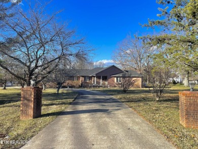 Come inside relax, stay warm, and enjoy your spacious living on Lake Tansi Village Country Club in Tennessee - for sale on GolfHomes.com, golf home, golf lot