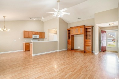 Elegant Ranch-Style Home with Serene Pond Views--Minutes from on Sandpiper Bay Golf and Country Club in North Carolina - for sale on GolfHomes.com, golf home, golf lot