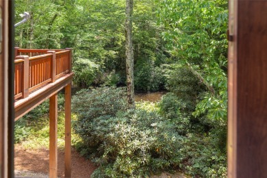 Welcome to a sophisticated mountain retreat on the banks of the on Cullasaja Club in North Carolina - for sale on GolfHomes.com, golf home, golf lot