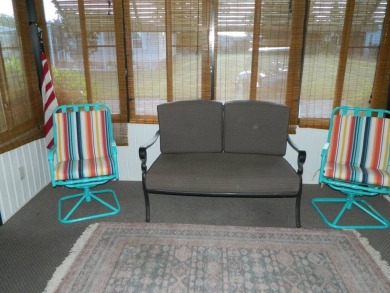 1985 Ventura 26x48 has been updated with double pane windows on Grasslands Golf and Country Club in Florida - for sale on GolfHomes.com, golf home, golf lot
