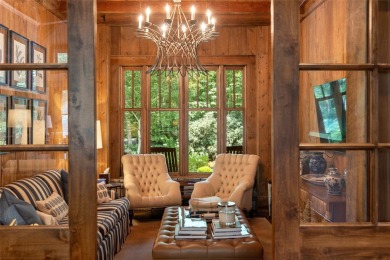 Welcome to a sophisticated mountain retreat on the banks of the on Cullasaja Club in North Carolina - for sale on GolfHomes.com, golf home, golf lot