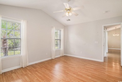 Elegant Ranch-Style Home with Serene Pond Views--Minutes from on Sandpiper Bay Golf and Country Club in North Carolina - for sale on GolfHomes.com, golf home, golf lot