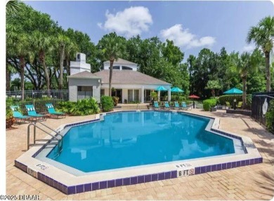 LUXURY IN GATED GOLF COMMUNITY - 3BR/2BA END UNIT | 128-B Golden on The Club At Pelican Bay - North Course in Florida - for sale on GolfHomes.com, golf home, golf lot