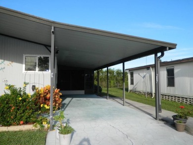 1985 Ventura 26x48 has been updated with double pane windows on Grasslands Golf and Country Club in Florida - for sale on GolfHomes.com, golf home, golf lot
