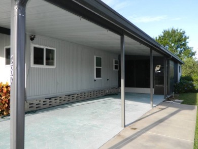 1985 Ventura 26x48 has been updated with double pane windows on Grasslands Golf and Country Club in Florida - for sale on GolfHomes.com, golf home, golf lot
