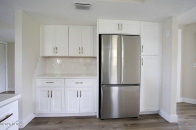 LUXURY IN GATED GOLF COMMUNITY - 3BR/2BA END UNIT | 128-B Golden on The Club At Pelican Bay - North Course in Florida - for sale on GolfHomes.com, golf home, golf lot