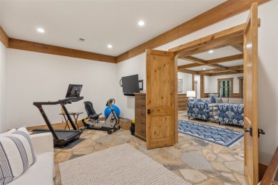 Welcome to a sophisticated mountain retreat on the banks of the on Cullasaja Club in North Carolina - for sale on GolfHomes.com, golf home, golf lot