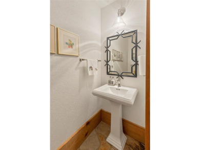 Welcome to a sophisticated mountain retreat on the banks of the on Cullasaja Club in North Carolina - for sale on GolfHomes.com, golf home, golf lot