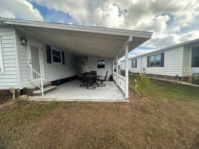 Discover the best of active, open-concept living in this on Lake Fairways Country Club in Florida - for sale on GolfHomes.com, golf home, golf lot