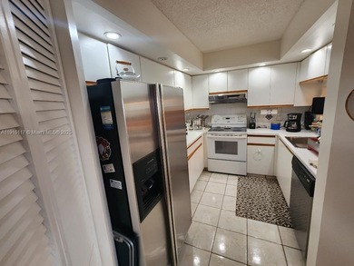 ENJOY RESORT STYLE LIVING IN CENTURY VILLAGE, ONE OF THE MOST on Flamingo Lakes Country Club in Florida - for sale on GolfHomes.com, golf home, golf lot