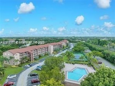 ENJOY RESORT STYLE LIVING IN CENTURY VILLAGE, ONE OF THE MOST on Flamingo Lakes Country Club in Florida - for sale on GolfHomes.com, golf home, golf lot