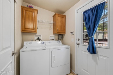 Don't miss this rare opportunity-- A 4-bedroom manufactured home on Pinewood Country Club in Arizona - for sale on GolfHomes.com, golf home, golf lot