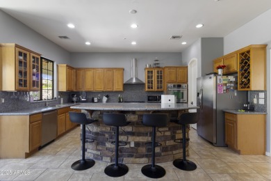 This luxurious residence offers a rare blend of sophistication on Wigwam Golf  Resort Litchfield Park  in Arizona - for sale on GolfHomes.com, golf home, golf lot