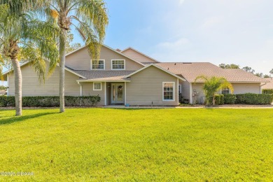 Beautifully updated end-unit 2/2 condo perfectly situated along on Spruce Creek Golf Club in Florida - for sale on GolfHomes.com, golf home, golf lot