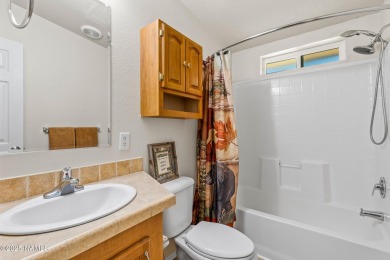 Don't miss this rare opportunity-- A 4-bedroom manufactured home on Pinewood Country Club in Arizona - for sale on GolfHomes.com, golf home, golf lot