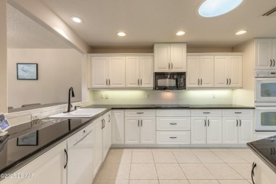 Beautifully updated end-unit 2/2 condo perfectly situated along on Spruce Creek Golf Club in Florida - for sale on GolfHomes.com, golf home, golf lot