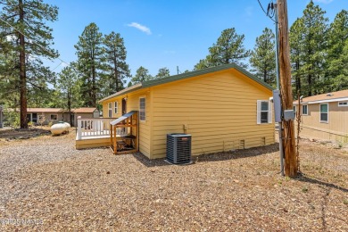 Don't miss this rare opportunity-- A 4-bedroom manufactured home on Pinewood Country Club in Arizona - for sale on GolfHomes.com, golf home, golf lot