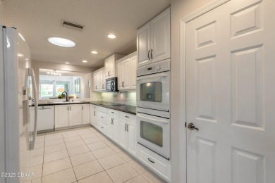 Beautifully updated end-unit 2/2 condo perfectly situated along on Spruce Creek Golf Club in Florida - for sale on GolfHomes.com, golf home, golf lot