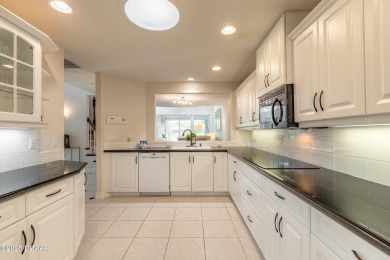 Beautifully updated end-unit 2/2 condo perfectly situated along on Spruce Creek Golf Club in Florida - for sale on GolfHomes.com, golf home, golf lot