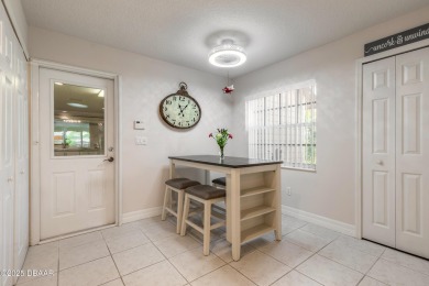 Beautifully updated end-unit 2/2 condo perfectly situated along on Spruce Creek Golf Club in Florida - for sale on GolfHomes.com, golf home, golf lot