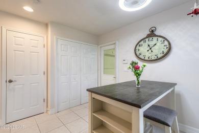 Beautifully updated end-unit 2/2 condo perfectly situated along on Spruce Creek Golf Club in Florida - for sale on GolfHomes.com, golf home, golf lot