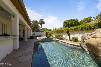 This luxurious residence offers a rare blend of sophistication on Wigwam Golf  Resort Litchfield Park  in Arizona - for sale on GolfHomes.com, golf home, golf lot