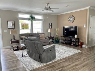 This Blue Coral model has a WATER VIEW from every room in the on Water Oak Country Club Estates in Florida - for sale on GolfHomes.com, golf home, golf lot