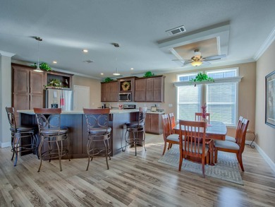 This Blue Coral model has a WATER VIEW from every room in the on Water Oak Country Club Estates in Florida - for sale on GolfHomes.com, golf home, golf lot