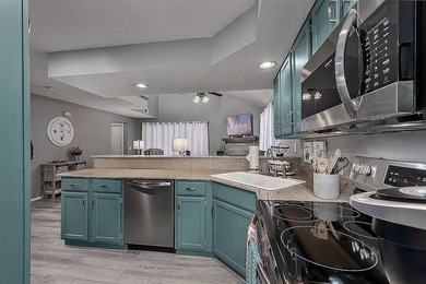 This move-in ready condo comes furnished and is a great place on Pointe Royale Village Country Club in Missouri - for sale on GolfHomes.com, golf home, golf lot