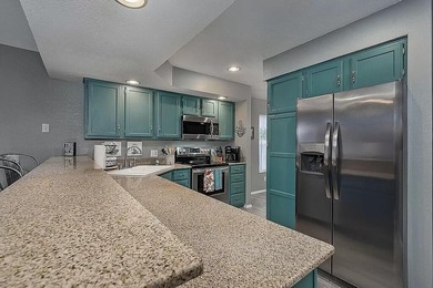 This move-in ready condo comes furnished and is a great place on Pointe Royale Village Country Club in Missouri - for sale on GolfHomes.com, golf home, golf lot