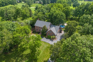 Experience timeless elegance in this custom-built Kentucky on Greenbrier Golf and Country Club in Kentucky - for sale on GolfHomes.com, golf home, golf lot
