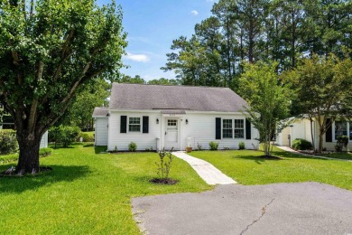 Welcome to this charming 2-bedroom, 2-bath ranch-style patio on Heron Point Golf Club in South Carolina - for sale on GolfHomes.com, golf home, golf lot