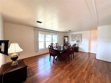 PRICE CORRECTION!! 2/2 double-wide with a huge family room on Continental Country Club in Florida - for sale on GolfHomes.com, golf home, golf lot