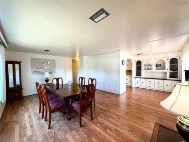 PRICE CORRECTION!! 2/2 double-wide with a huge family room on Continental Country Club in Florida - for sale on GolfHomes.com, golf home, golf lot