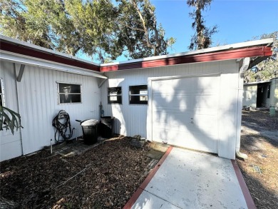 PRICE CORRECTION!! 2/2 double-wide with a huge family room on Continental Country Club in Florida - for sale on GolfHomes.com, golf home, golf lot