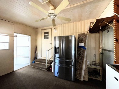 PRICE CORRECTION!! 2/2 double-wide with a huge family room on Continental Country Club in Florida - for sale on GolfHomes.com, golf home, golf lot