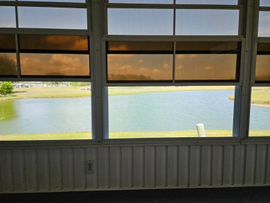 This home is on leased land and is located in a 55+ resort-style on Big Cypress Golf and Country Club in Florida - for sale on GolfHomes.com, golf home, golf lot