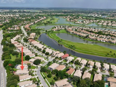 Nestled within the sought-after Aberdeen Golf & Country Club on Aberdeen Golf and Country Club in Florida - for sale on GolfHomes.com, golf home, golf lot