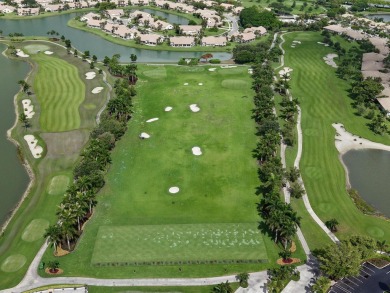 Nestled within the sought-after Aberdeen Golf & Country Club on Aberdeen Golf and Country Club in Florida - for sale on GolfHomes.com, golf home, golf lot