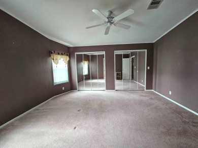 This home is on leased land and is located in a 55+ resort-style on Big Cypress Golf and Country Club in Florida - for sale on GolfHomes.com, golf home, golf lot