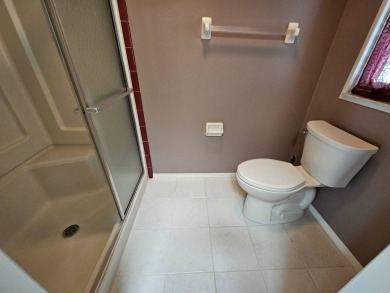 This home is on leased land and is located in a 55+ resort-style on Big Cypress Golf and Country Club in Florida - for sale on GolfHomes.com, golf home, golf lot